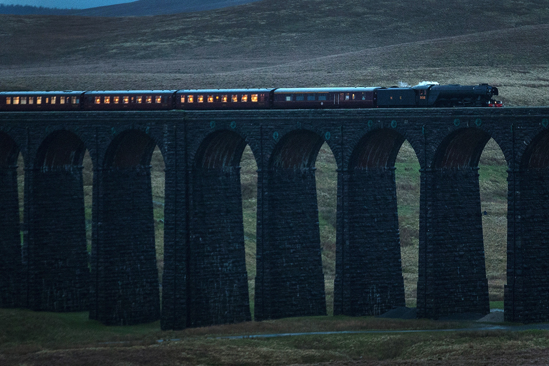 The Flying Scotsman hauls the Winter Cumbrian Mountain Express over the Ribblehead Viaduct on February 6, 2016 in Kendal, England. The Flying Scotsman is doing its first hauls since undergoing a $5.6 million, decade-long restoration. (Photo by Christopher Furlong/Getty Images)